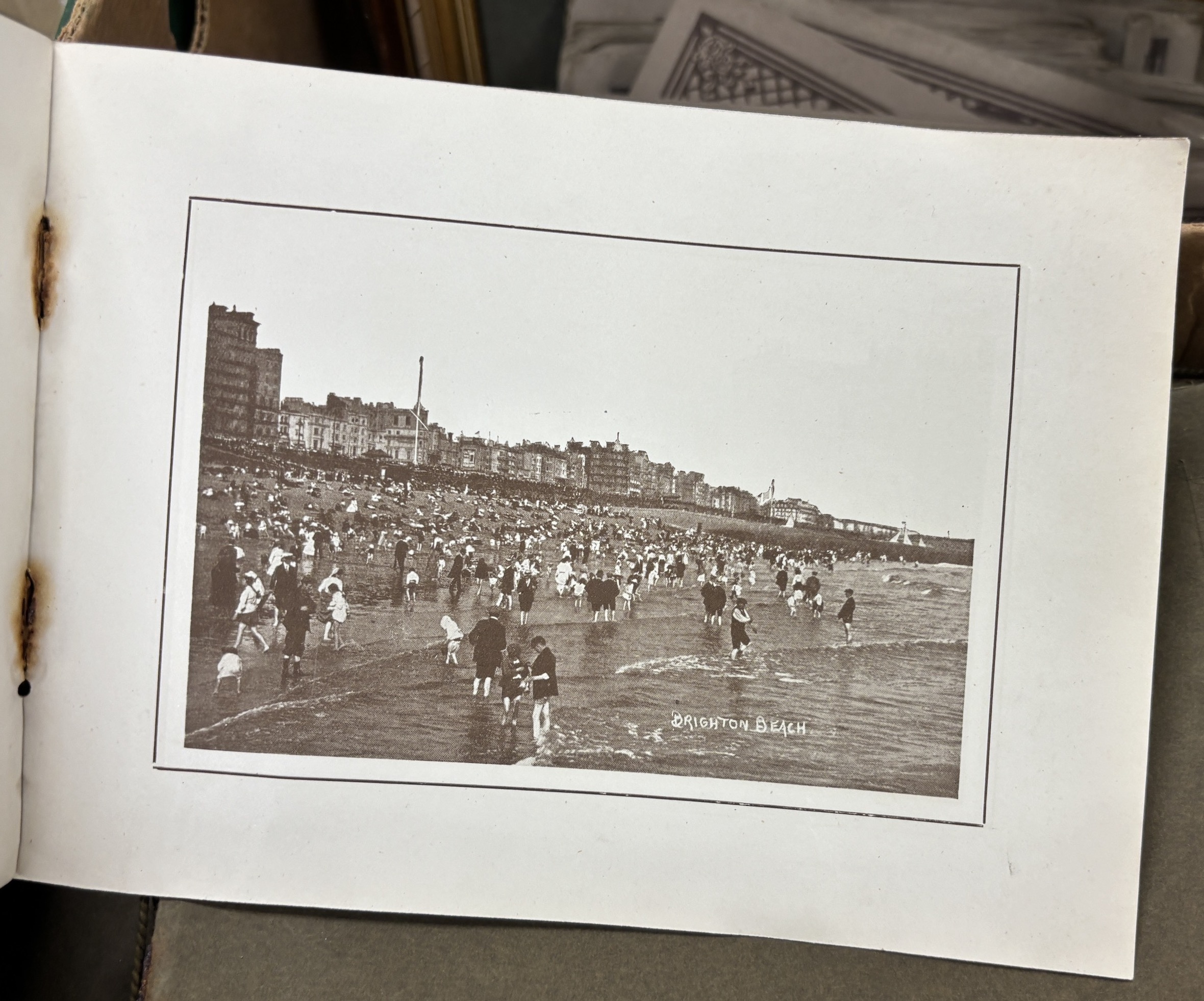 A collection of early 20th century Brighton and Hove related postcards, ex-shop stock with some still in trade boxes, multiple duplicates of the same postcard, including some from the Brighton Palace series, some publish